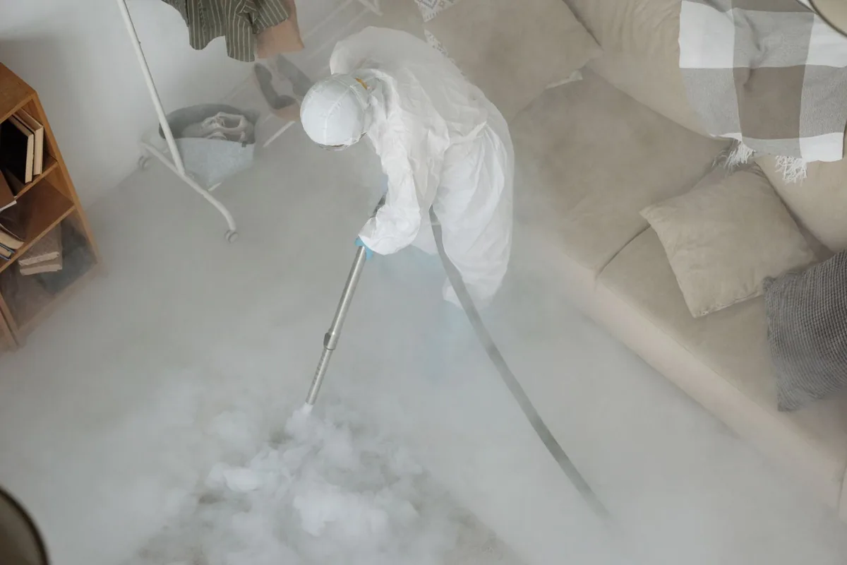Biohazard cleanup technician in protective equipment, Federal Way, WA
